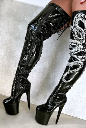 Sure! Heres an optimized title for the e-commerce product:

**Hella Heels Thicc Thigh-High 8-Inch Black and White Snake Print Boots**